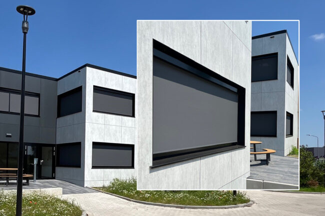 Modern pand met licht- en donkergrijze UniKern® gevelbekleding en houtlook entree.